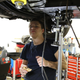 Mathias under his formerly automatic E30.